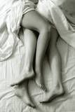 Lovers legs entwined Pictures, Images and Photos